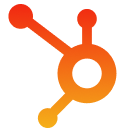 HubSpot logo — an orange and red gradient sprocket-and-magnet icon representing the HubSpot CRM platform, on a dark background.